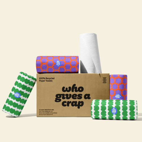 A large box of Who Gives A Crap 100% Recycled Paper Towels with colorful wrappers - eco-friendly, biodegradeable and sustainable  