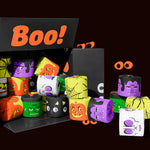Box of Who Gives A Crap Spooky Edition toilet paper spilling out with bright monster wrappers