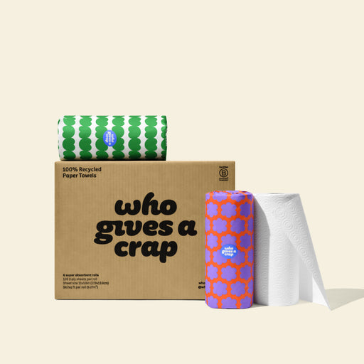 A small box of Who Gives A Crap 100% Recycled Paper Towels with colorful wrappers - eco-friendly, biodegradeable and sustainable  