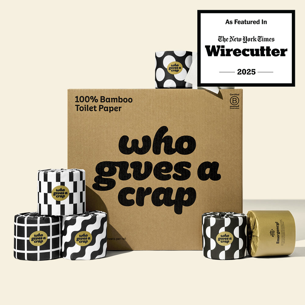 A large box of Who Gives A Crap 100% Bamboo Toilet Paper with black and white wrappers - eco-friendly, biodegradable and sustainable toilet paper. There is a badge stating "As Featured in The New York Times Wirecutter" 2025