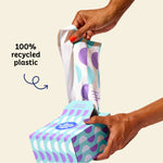 Who Gives a Crap medium 100% recycled plastic trash bag being pulled out of the box