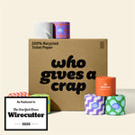 A large box of Who Gives A Crap 100% Recycled Toilet Paper with colorful wrappers - eco-friendly, biodegradable and sustainable toilet paper. Displays a badge stating 