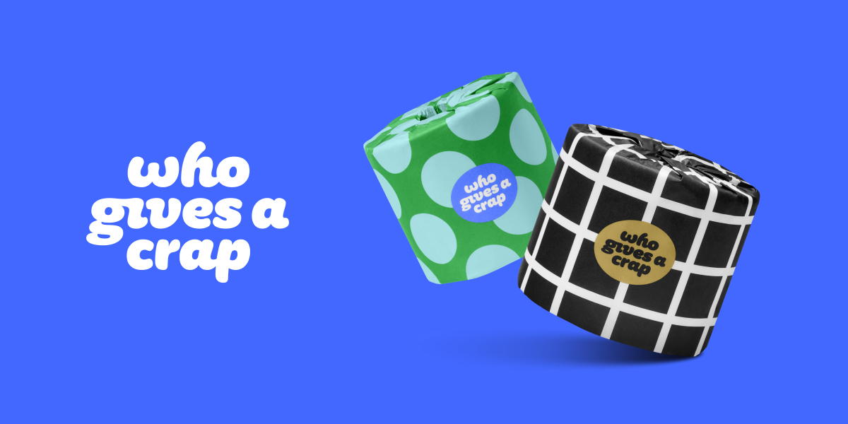 Who Gives A Crap bamboo and recycled toilet paper rolls on a bright blue background